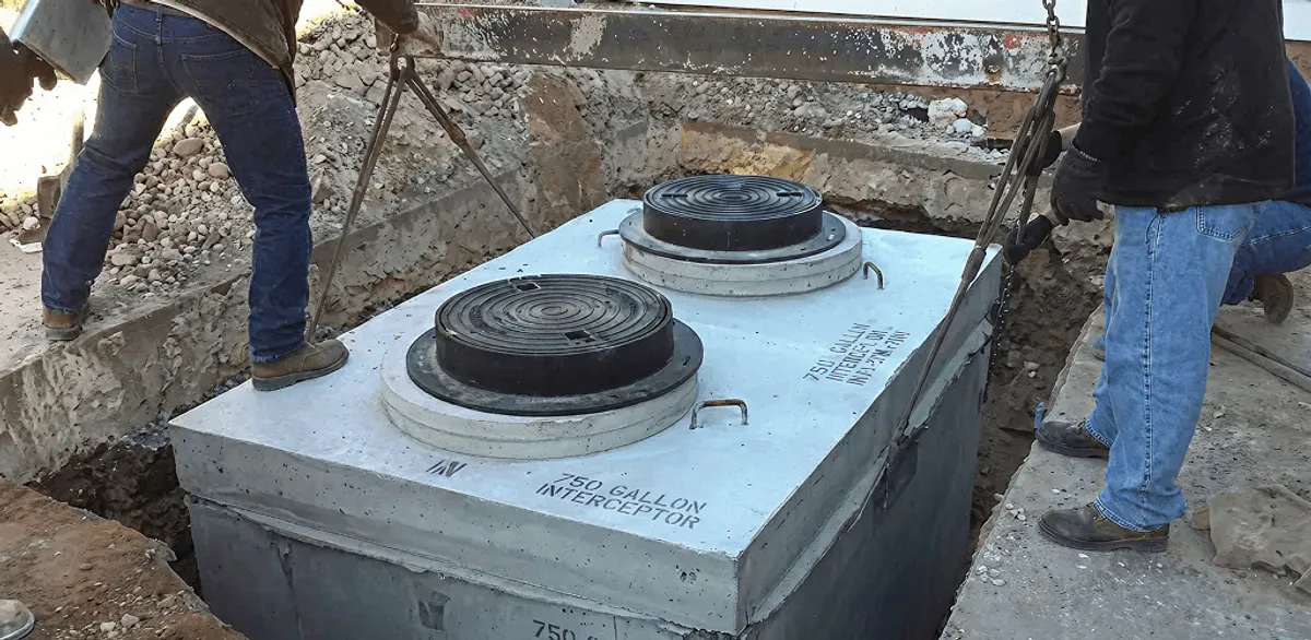 Grease trap installation for a commercial property drainage system in Birmingham, AL