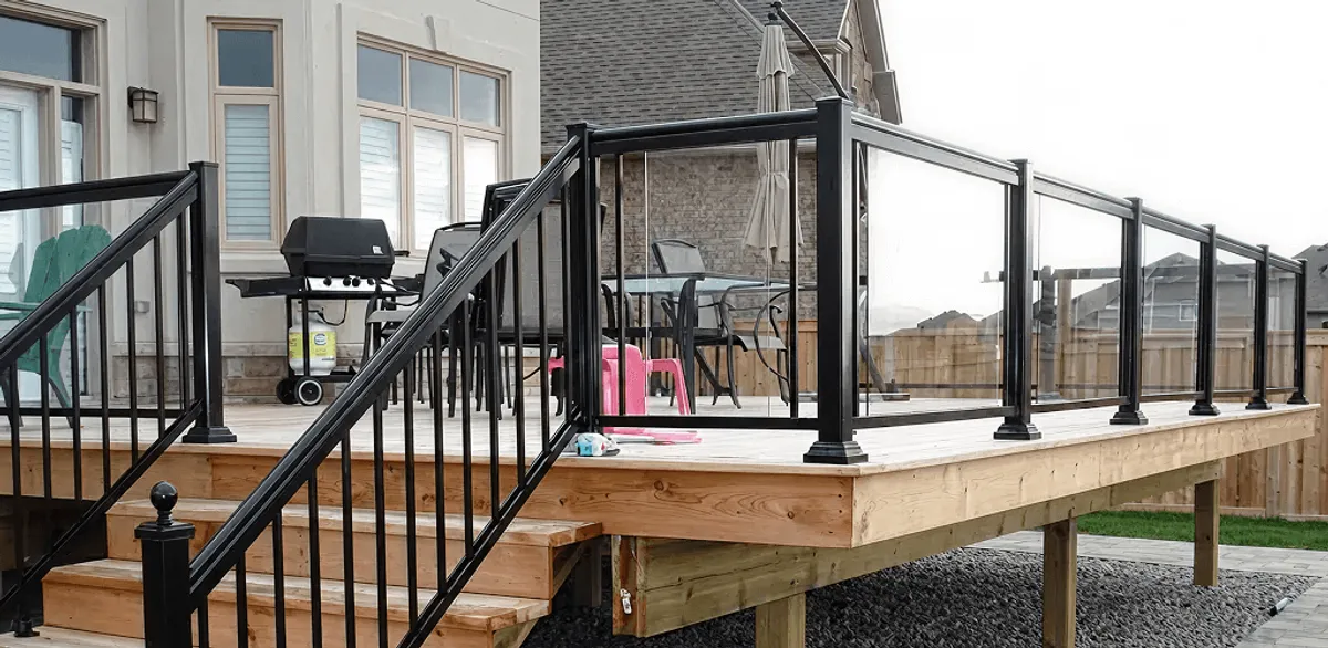 Handrail installation on a deck staircase for safety and code compliance in Birmingham, AL