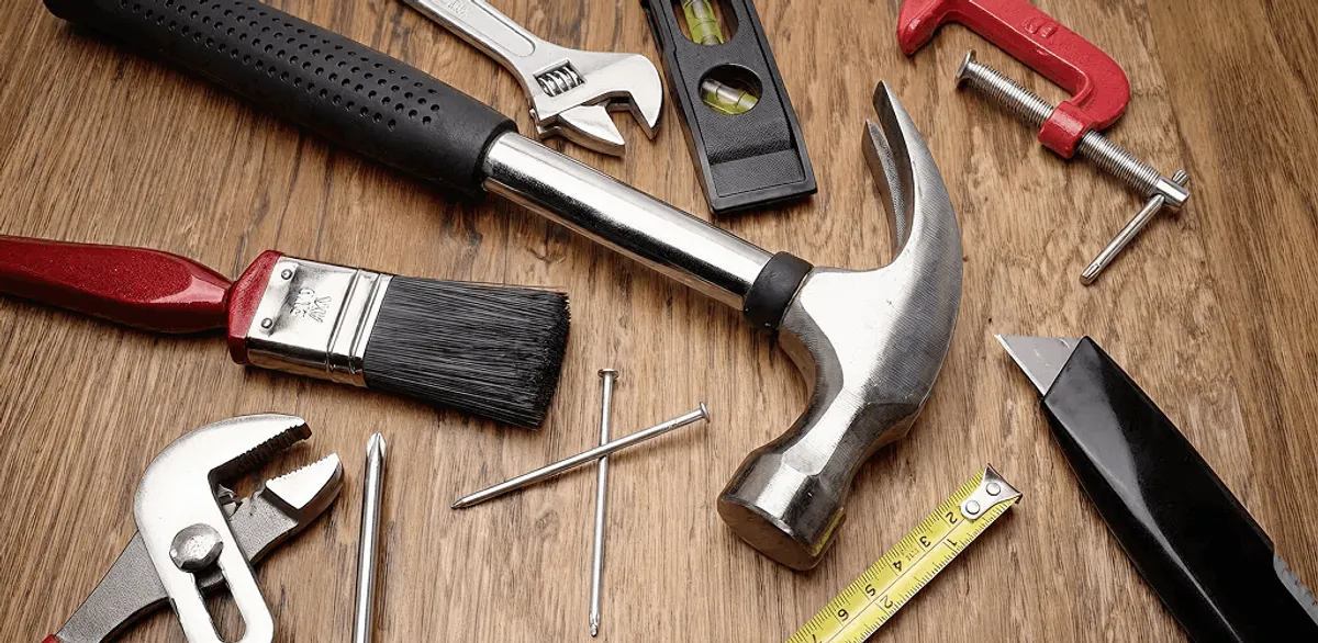 Handyman tools laid out for home repair and maintenance work in Birmingham, AL